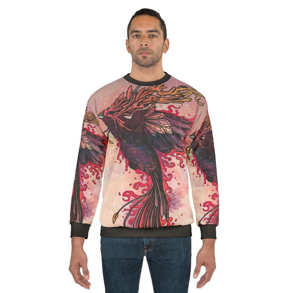 Vibrant phoenix bird sweatshirt with fiery feathers and mythical design