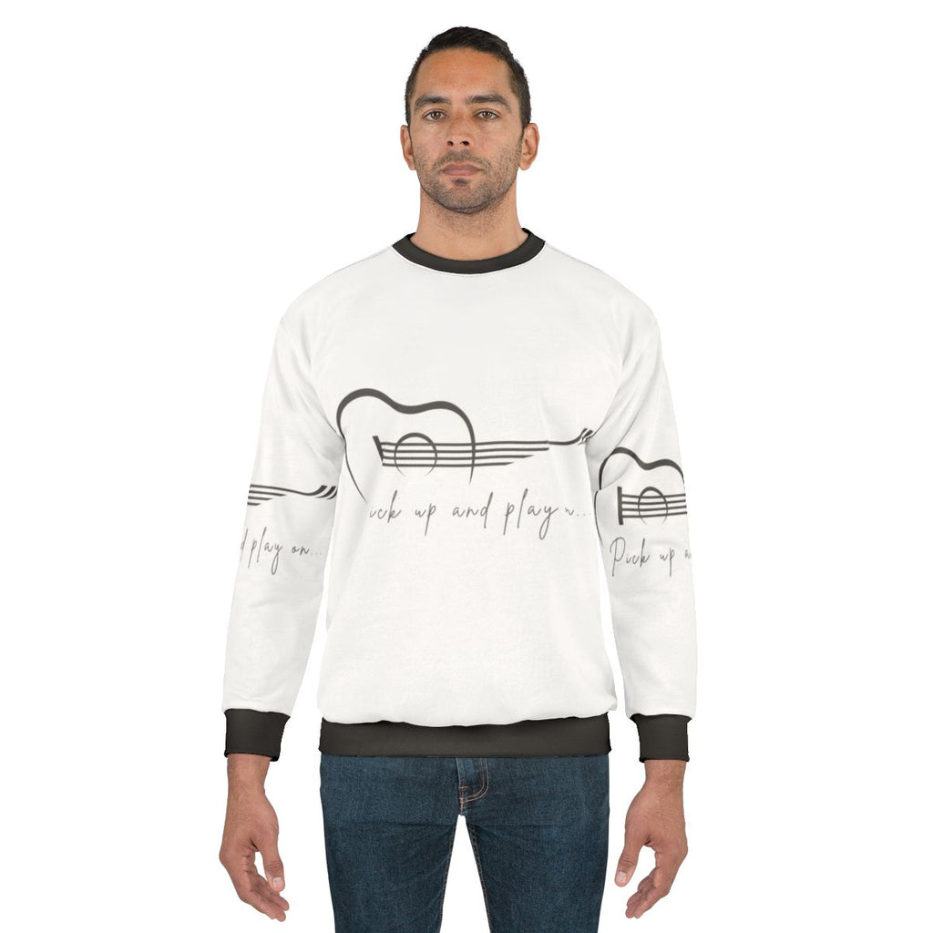 Pickup and Play On Music Sweatshirt featuring a guitar