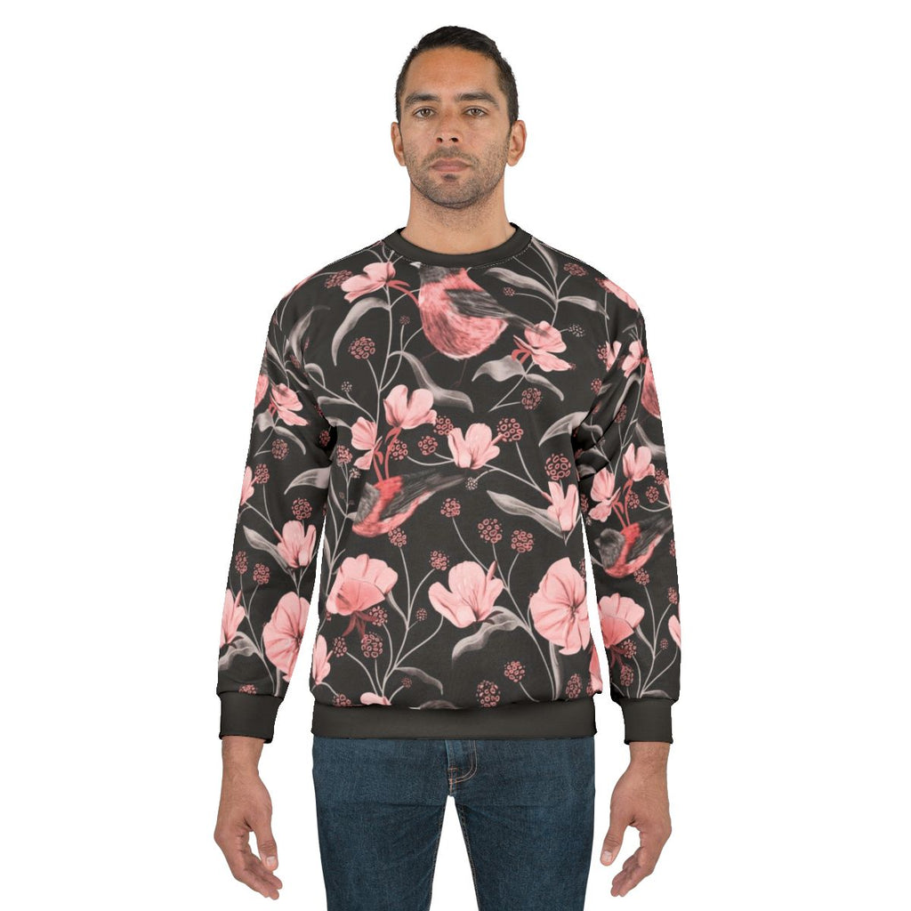 Pink birds and flowers botanical design on a sweatshirt