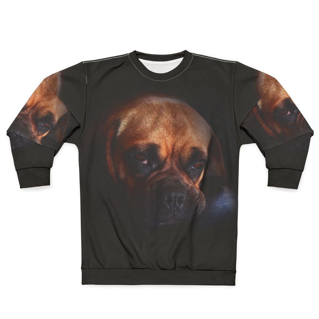 Cute puggle dog wearing a cozy sweatshirt