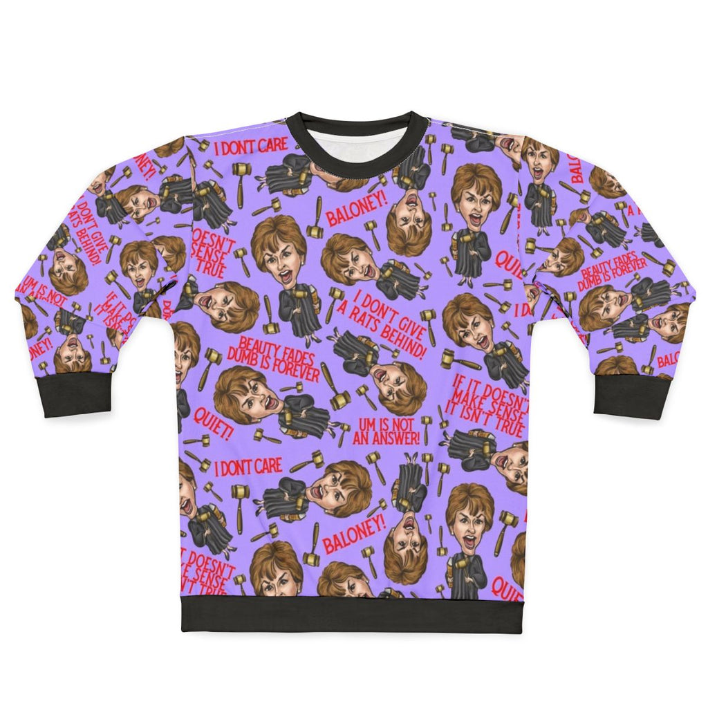 A purple sweatshirt featuring a print of TV personality Judge Judy