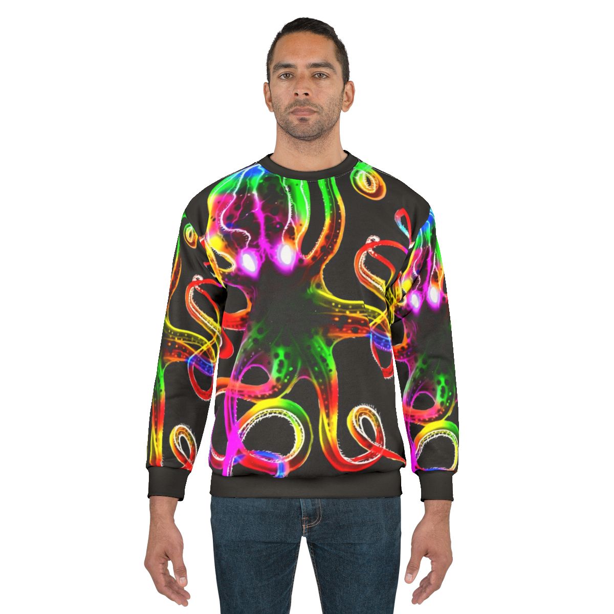 A vibrant rainbow octopus glowing in the dark on a sweatshirt
