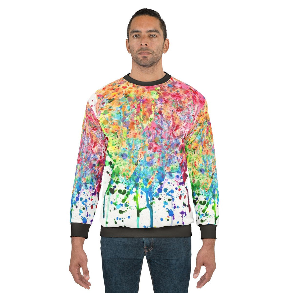 Colorful rainbow paint splatter drip design on a sweatshirt