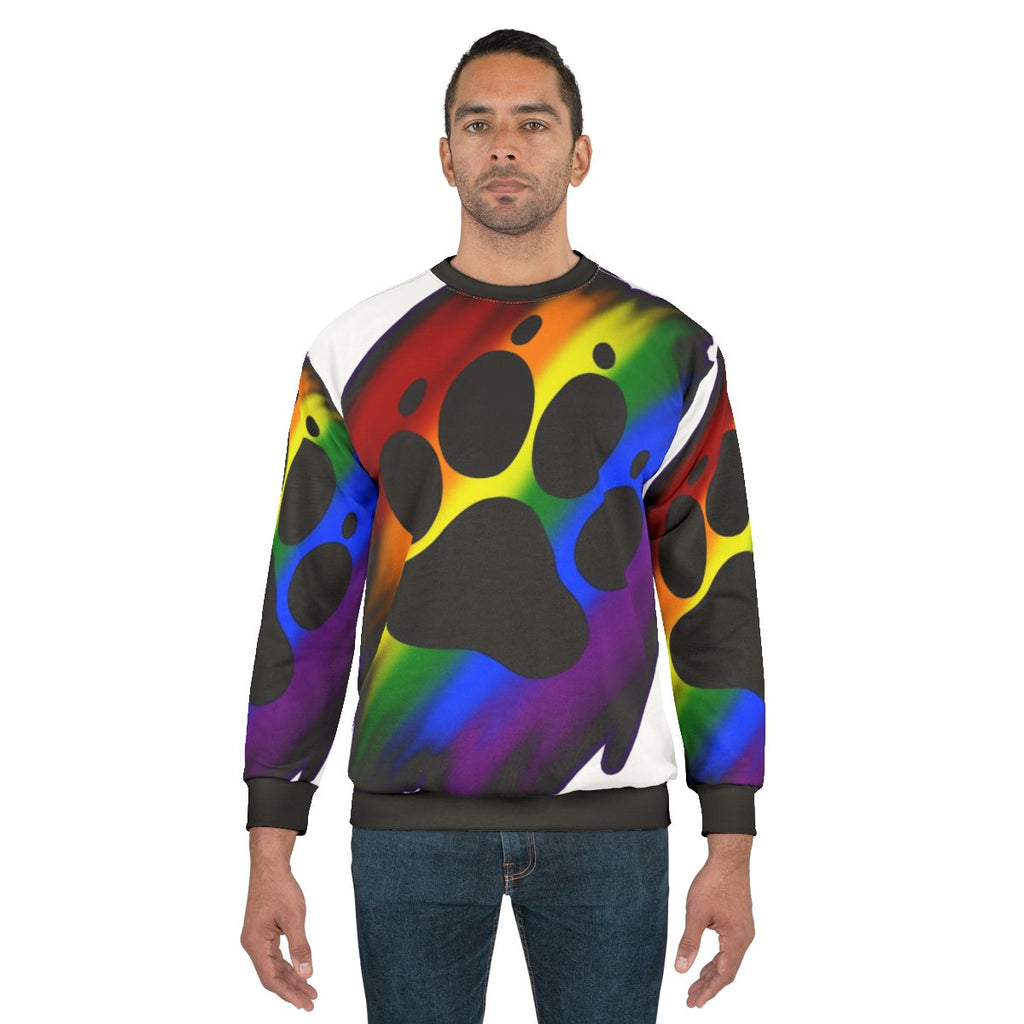 Colorful rainbow splatter design on a cozy sweatshirt