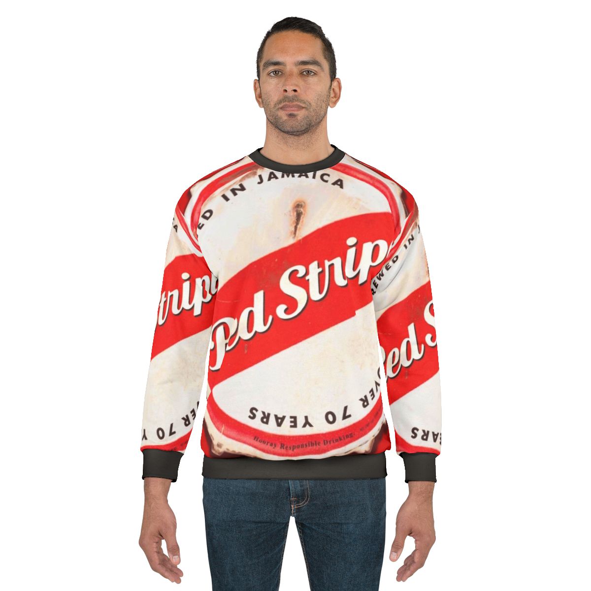 Red striped sweatshirt with bottle cap design inspired by Jamaica and reggae music