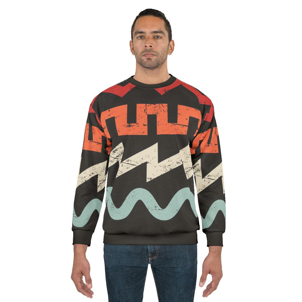 Retro synth waveform design on a sweatshirt for music producers