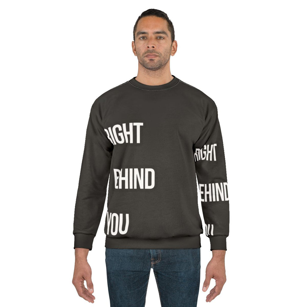 Chef sweatshirt with "Right Behind You" text
