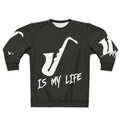Man wearing saxophone sweatshirt, saxophone-themed apparel