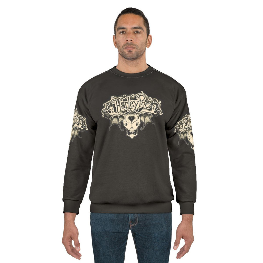 Scared Harley Skull Poe Wings Sweatshirt featuring the Harley Poe logo and artwork