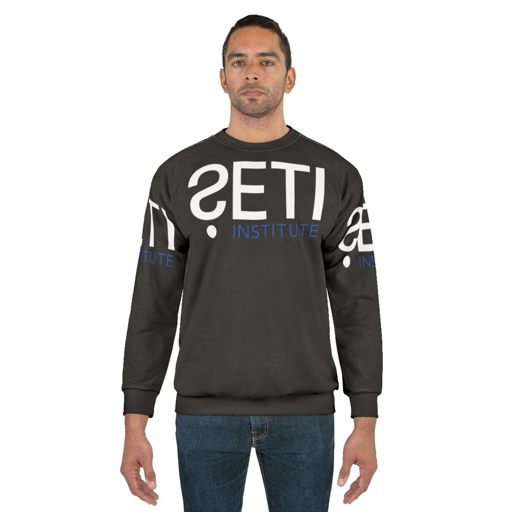 SETI Institute Sweatshirt featuring the SETI logo and space-themed graphics