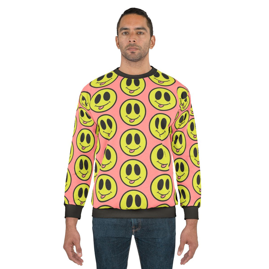 Silly smiley face graphic on a colorful neon sweatshirt