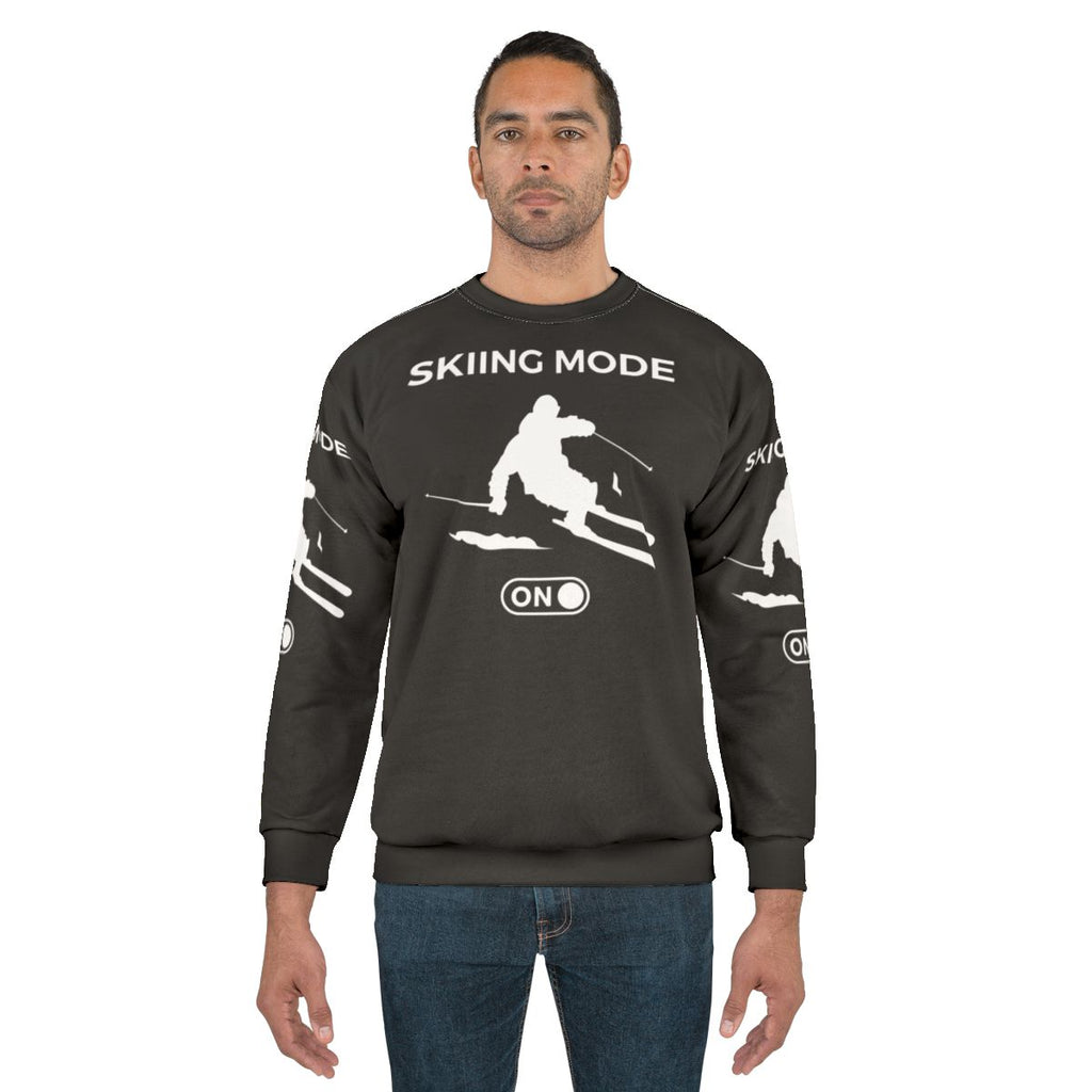Alpine ski winter sweatshirt with skiing mode on design