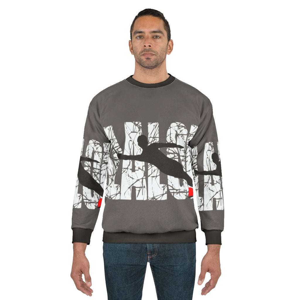 Slalom water skier silhouette on a navy blue sweatshirt