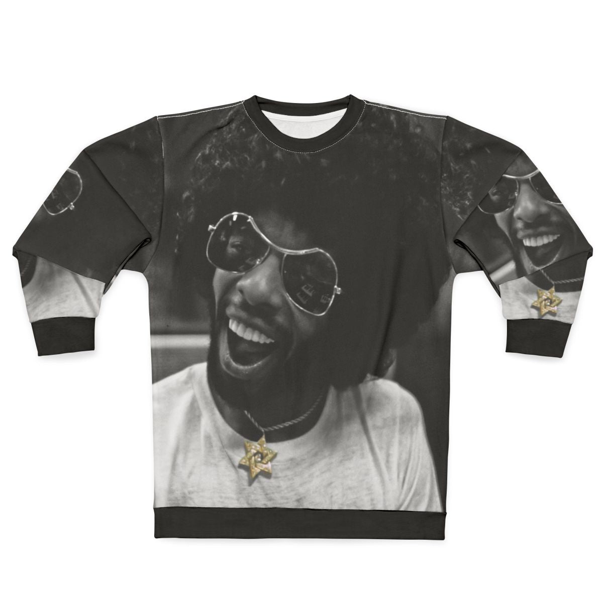 Sly Stone recording in the studio wearing a black and white sweatshirt