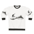 Snowboarder jumping in a snowy fir forest