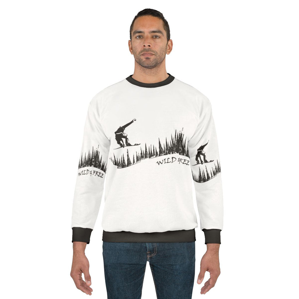 Snowboarder jumping in a snowy fir forest