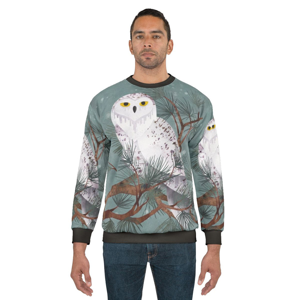 Snowy Sweatshirt with pine needles and snowflake design