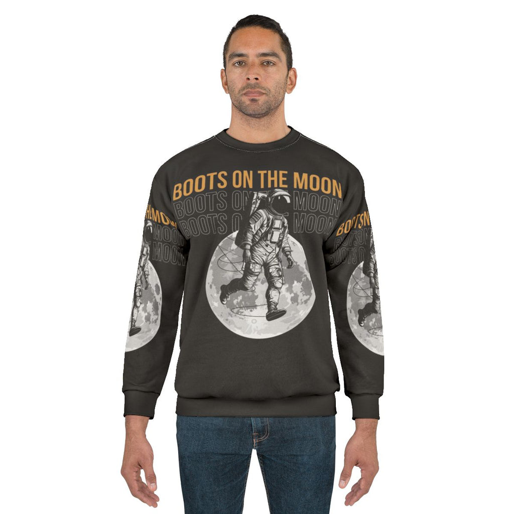 Space Force Boots on the Moon Sweatshirt featuring Netflix's Space Force logo and design