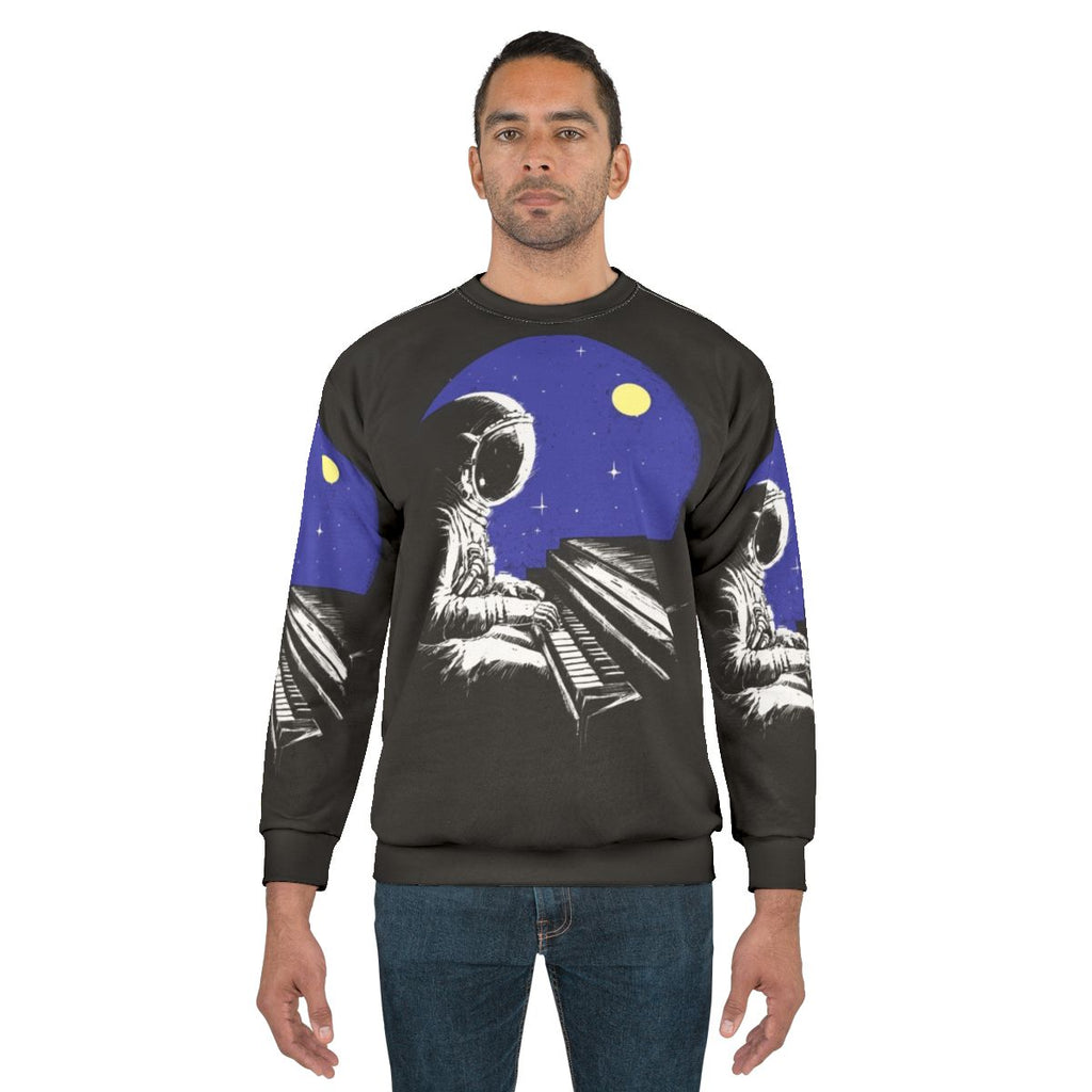 Space music sweatshirt with urban cityscape and musical notes