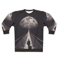 Man in space-themed sweatshirt floating in galaxy
