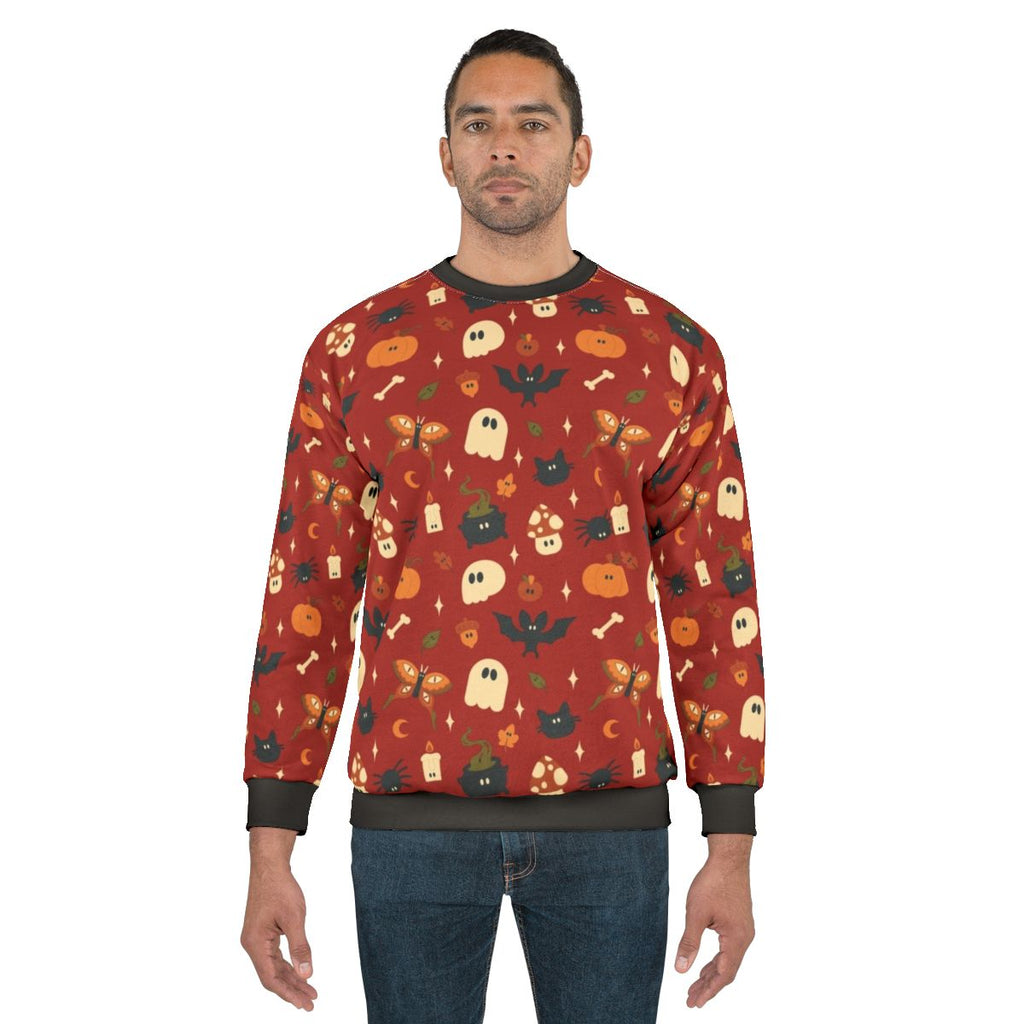 Spooky fall pattern sweatshirt with Halloween and autumn elements