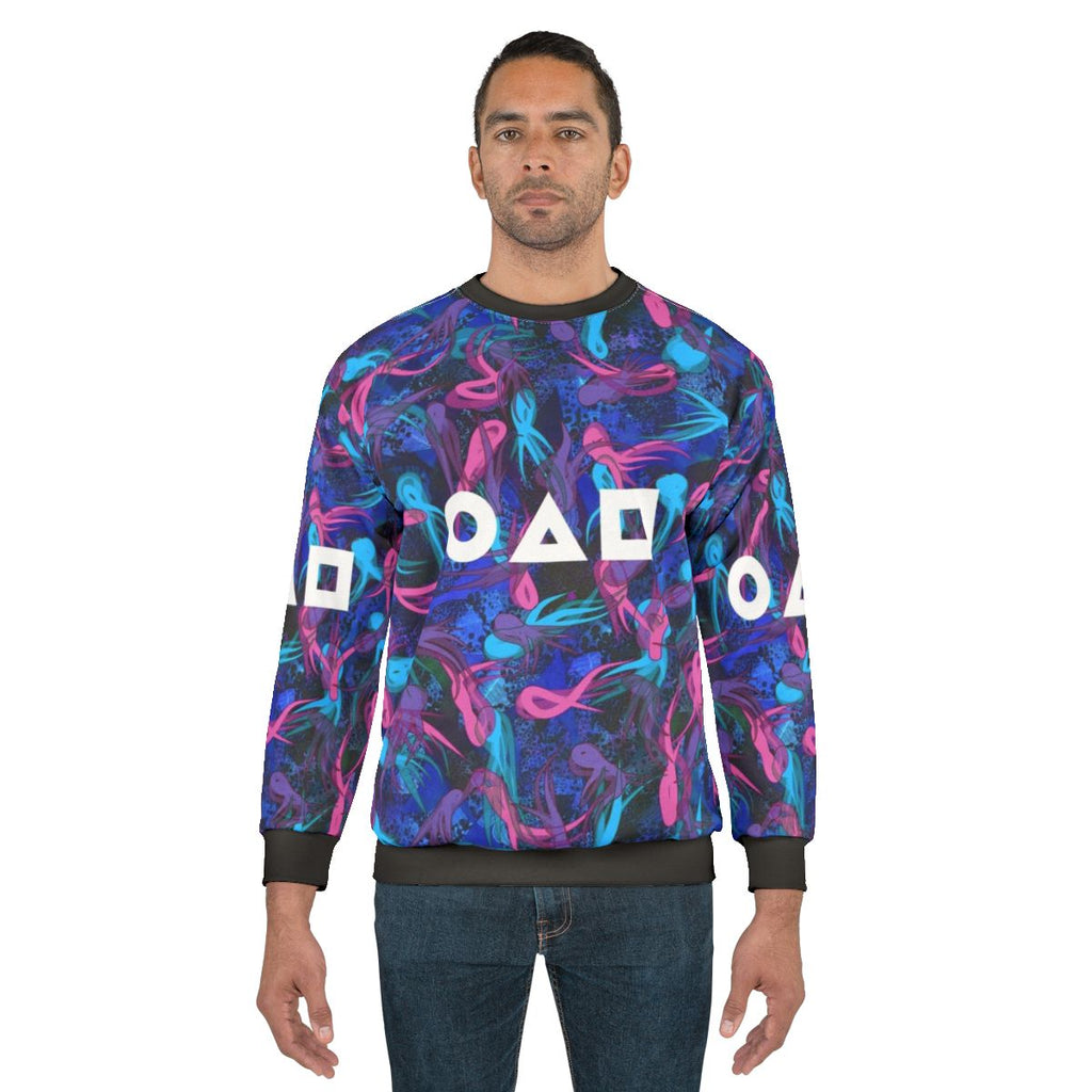 Squid Game Survival Pattern Sweatshirt with characters and symbols from the Netflix series