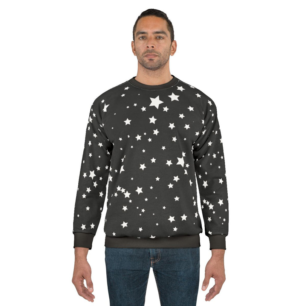 Cosmic stars sweatshirt featuring a galaxy-inspired starry design