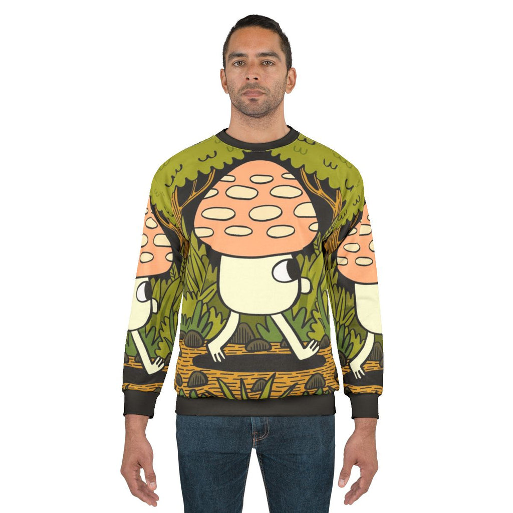 Sweatshirt featuring a nature-inspired design with autumn leaves and woodland creatures