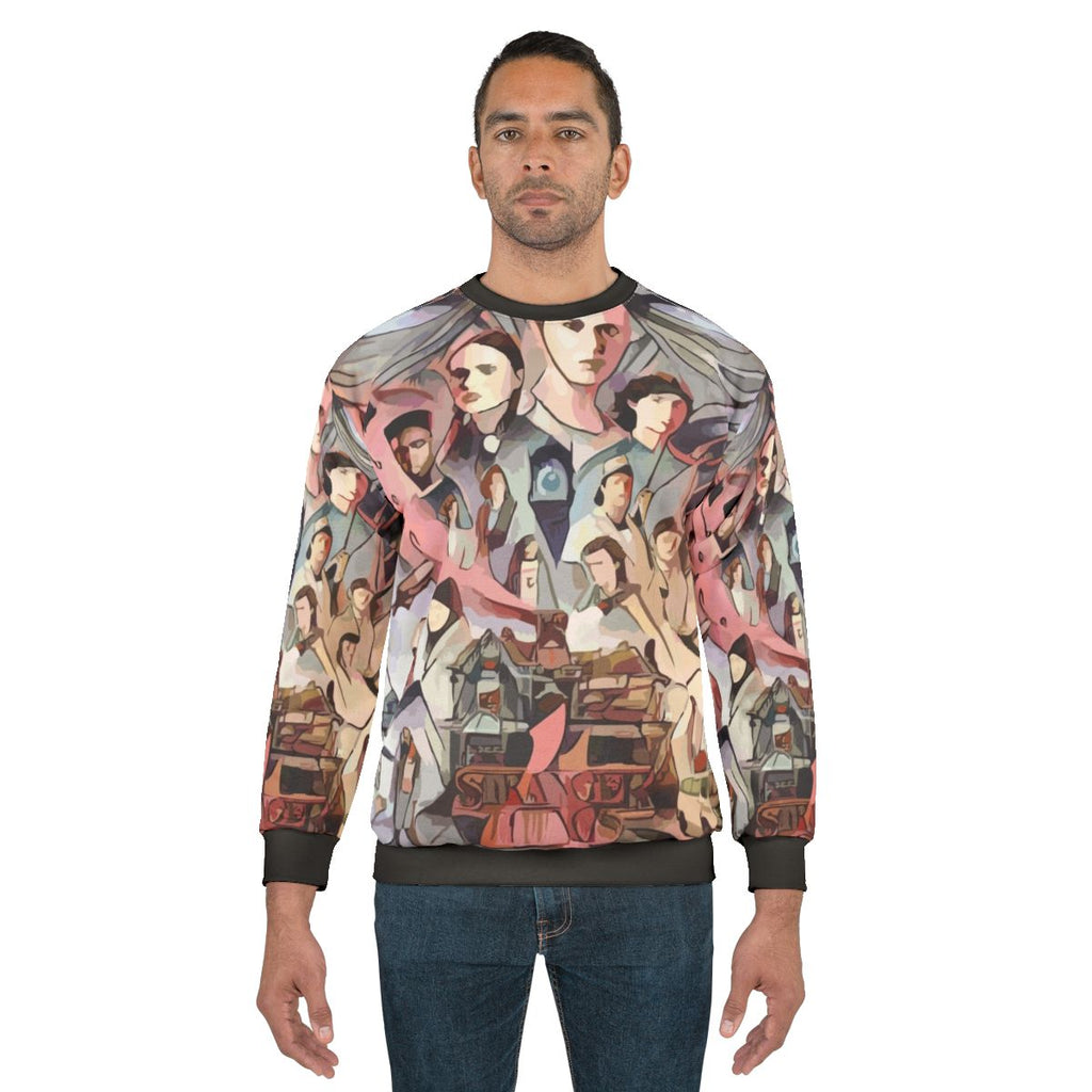 Stranger Things World Sweatshirt 2 featuring characters and imagery from the popular Netflix series
