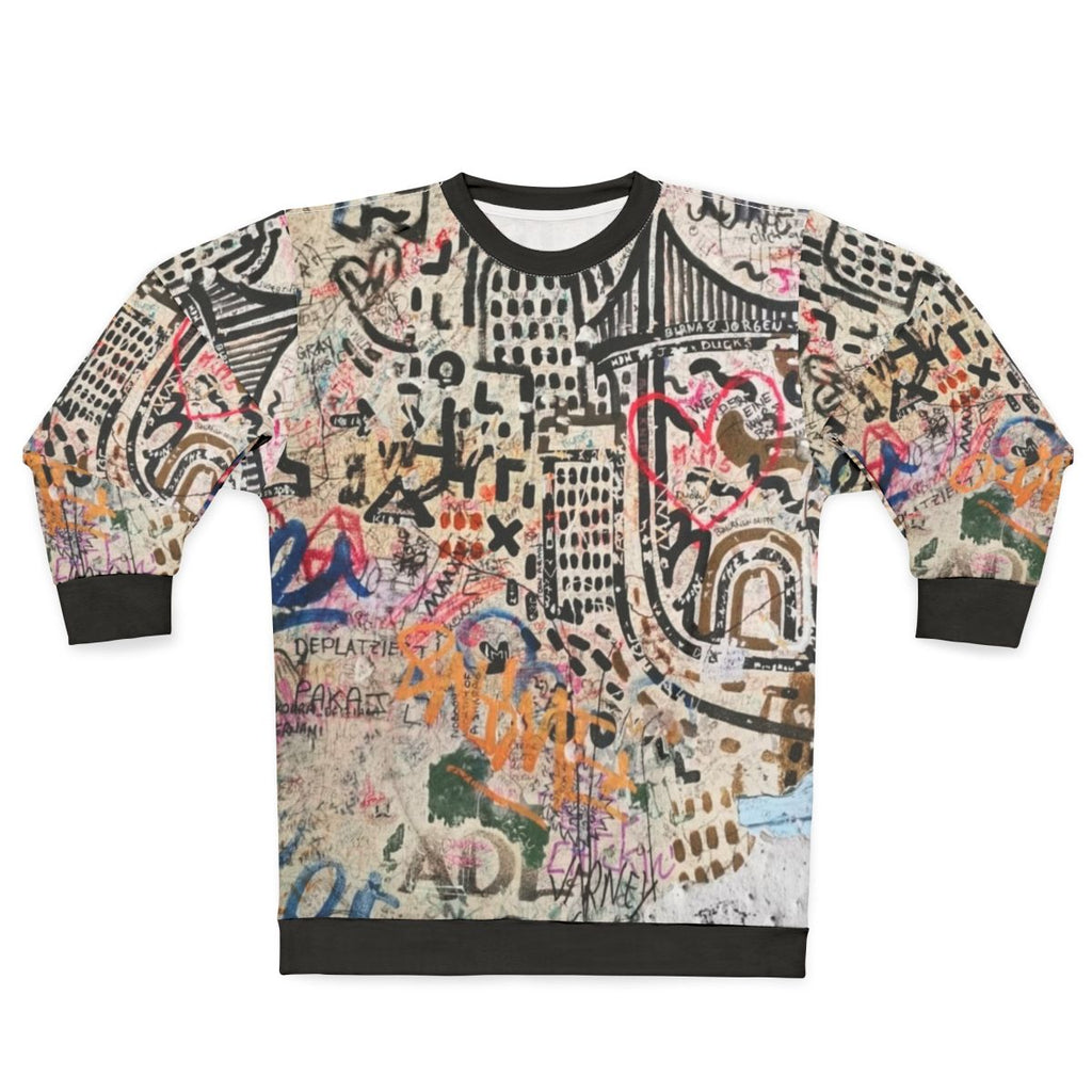 Street art inspired sweatshirt featuring Banksy-style graffiti design