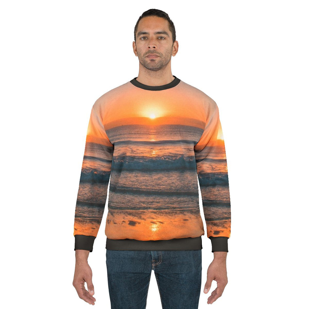 Sunset over the beach sweatshirt featuring a scenic ocean sunset