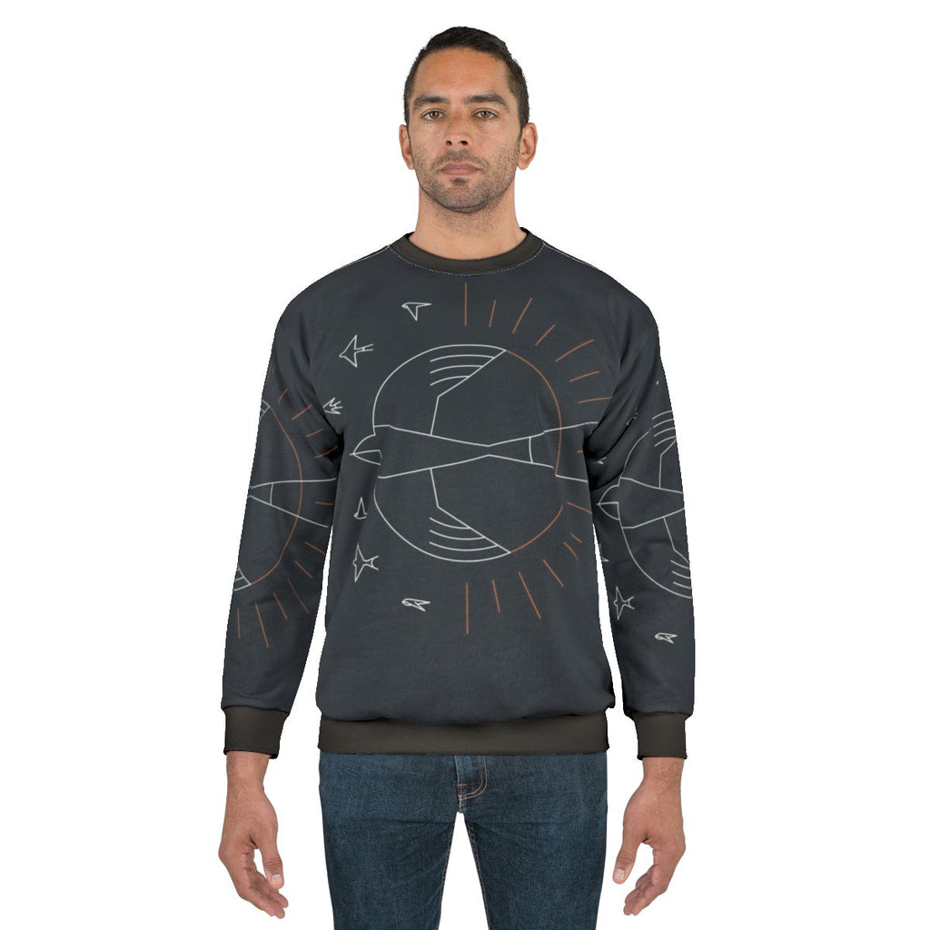 Minimalist sweatshirt with swallow bird and sun rays design