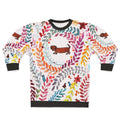 Dachshund wearing colorful floral sweatshirt