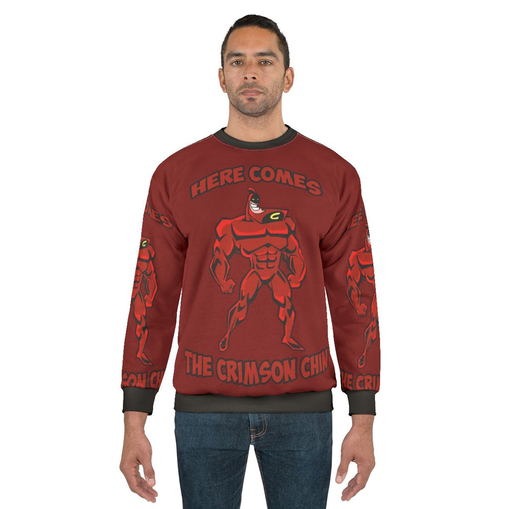 The Crimson Chin Sweatshirt with the Iconic Cartoon Character