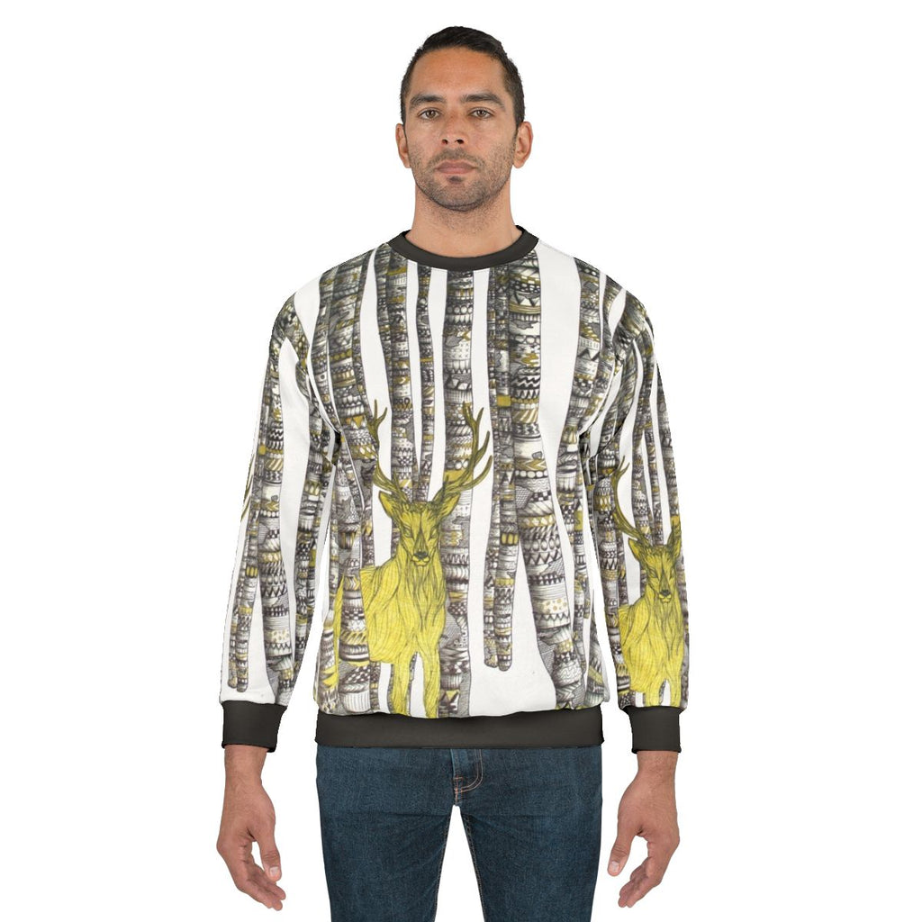 Golden stag silhouette on a cozy black and white sweatshirt