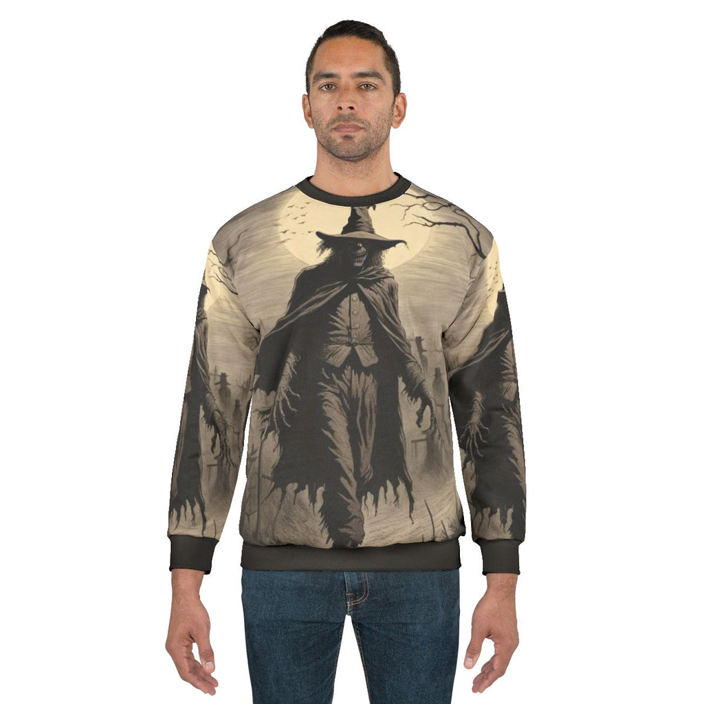 Keeper of the Fields haunting sweatshirt with scarecrow and autumn night design