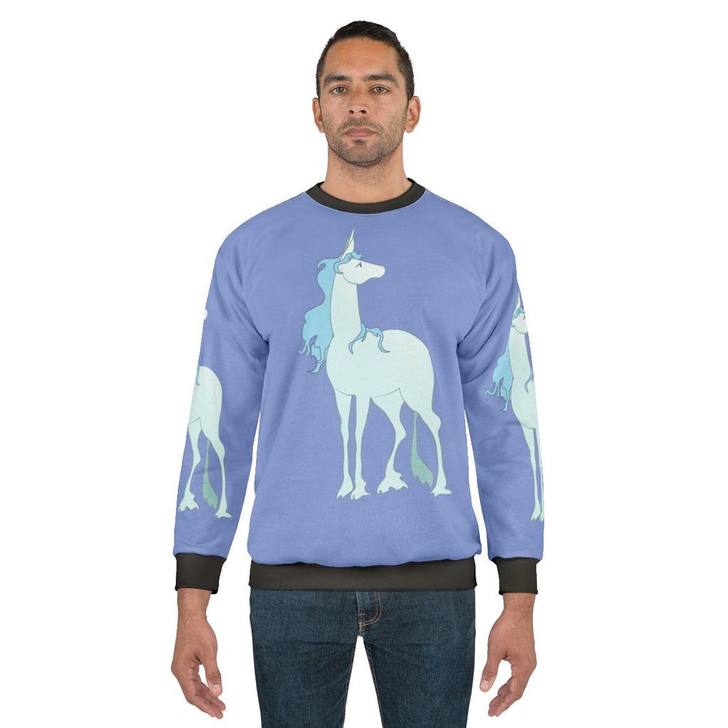 Amalthea illustration from the classic fantasy film The Last Unicorn on a cozy sweatshirt