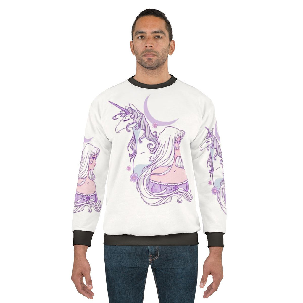 The Last Unicorn fantasy anime character on a cozy sweatshirt