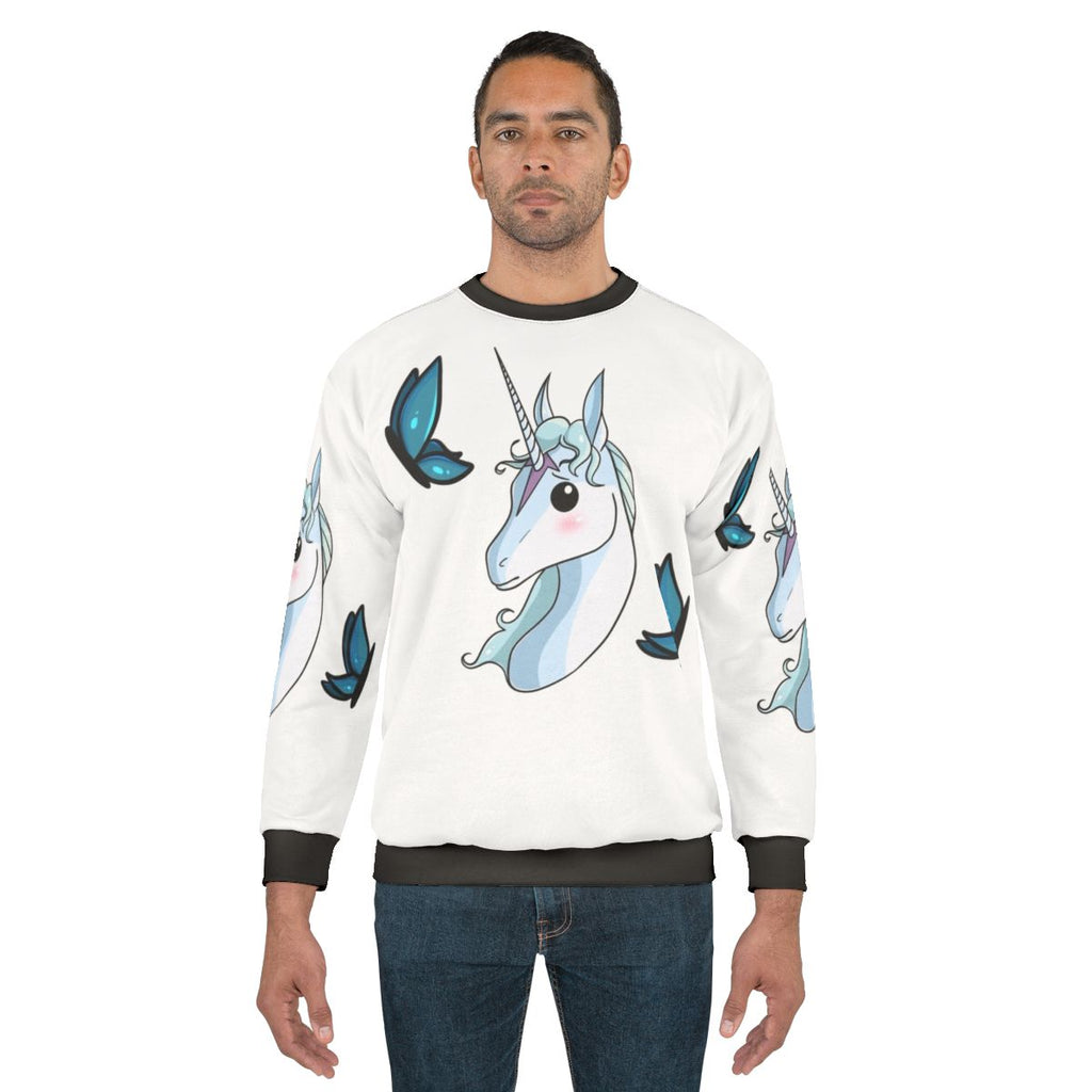 The Last Unicorn animated sweatshirt featuring a cutesy portrait of the iconic unicorn character