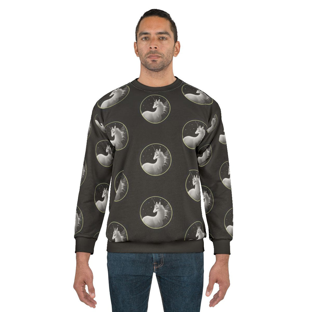 The Last Unicorn fantasy illustration printed on a sweatshirt