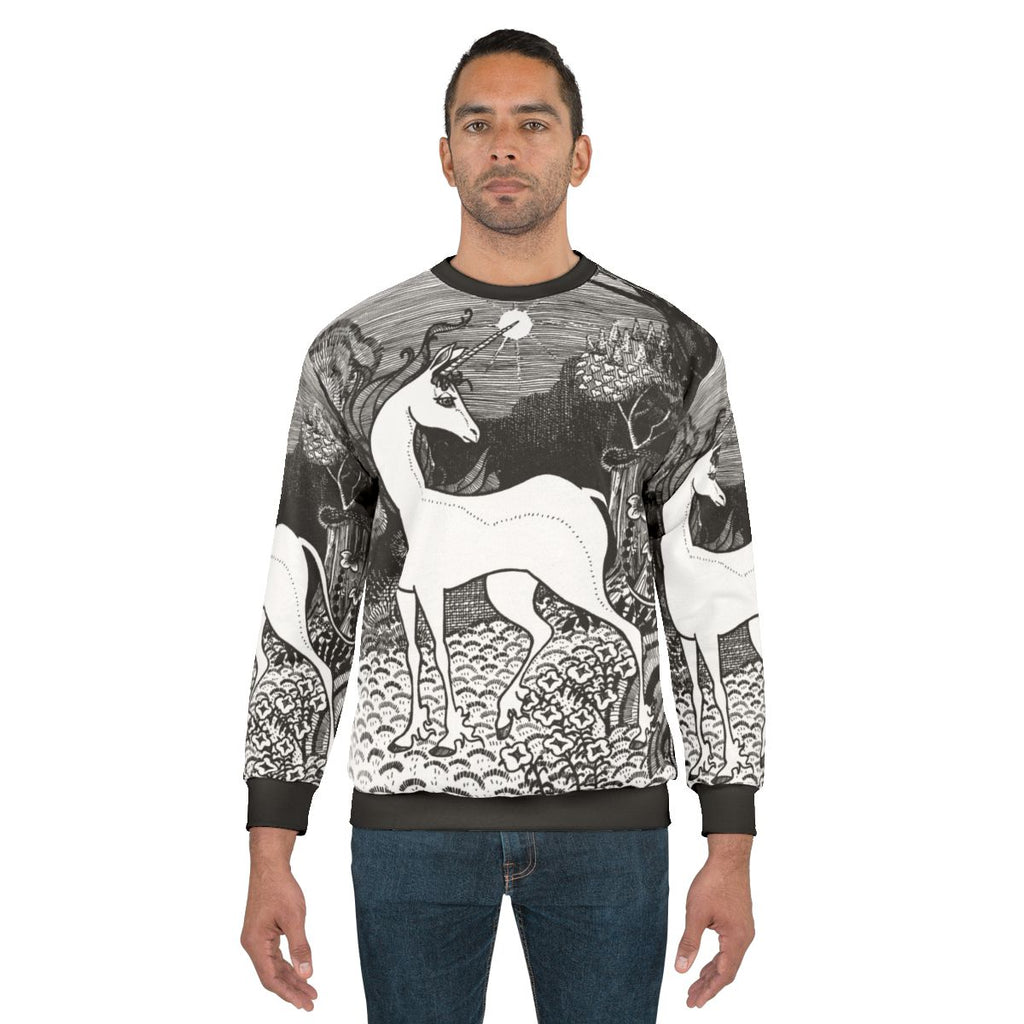 The Last Unicorn Sweatshirt featuring a fantasy illustration of the mythical creature