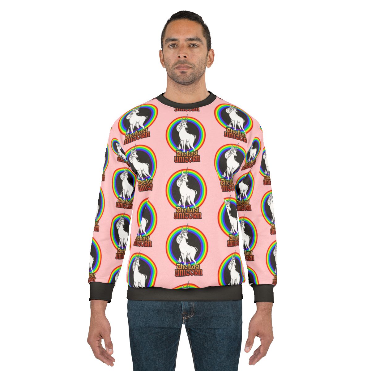 The Last Unicorn rainbow sweatshirt with a white unicorn and rainbow design