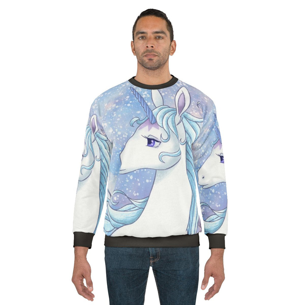 The Last Unicorn pastel-colored sweatshirt featuring a magical unicorn design