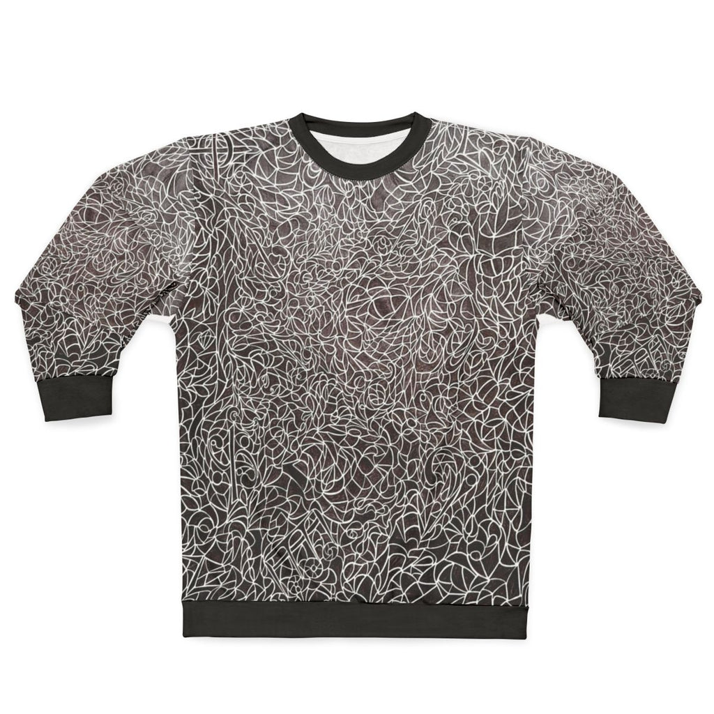 The Music Maze Sweatshirt featuring a black and white pattern with treble clefs, bass clefs, and musical notes