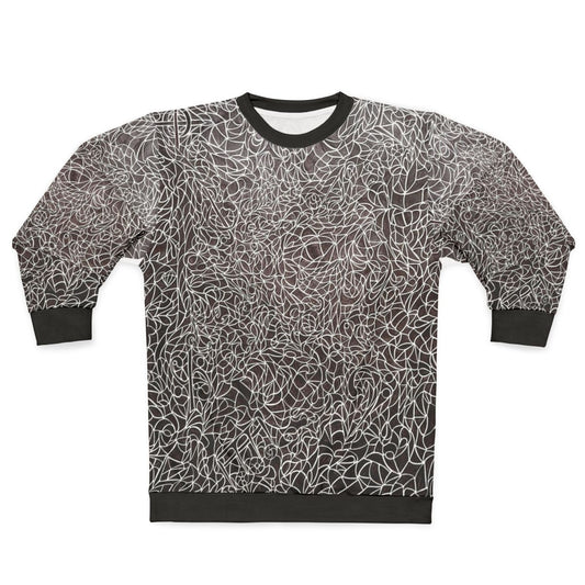 The Music Maze Sweatshirt featuring a black and white pattern with treble clefs, bass clefs, and musical notes