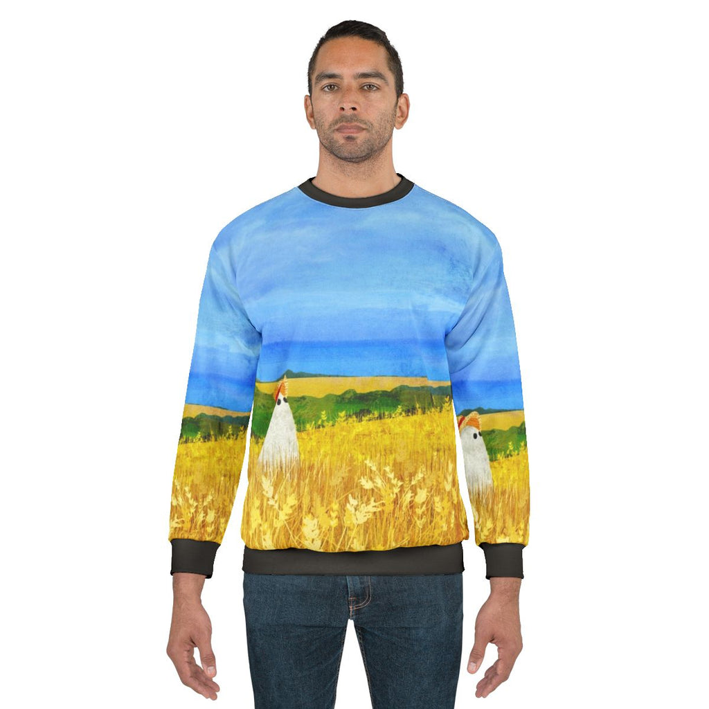 Sweatshirt with a ghostly figure in a wheat field