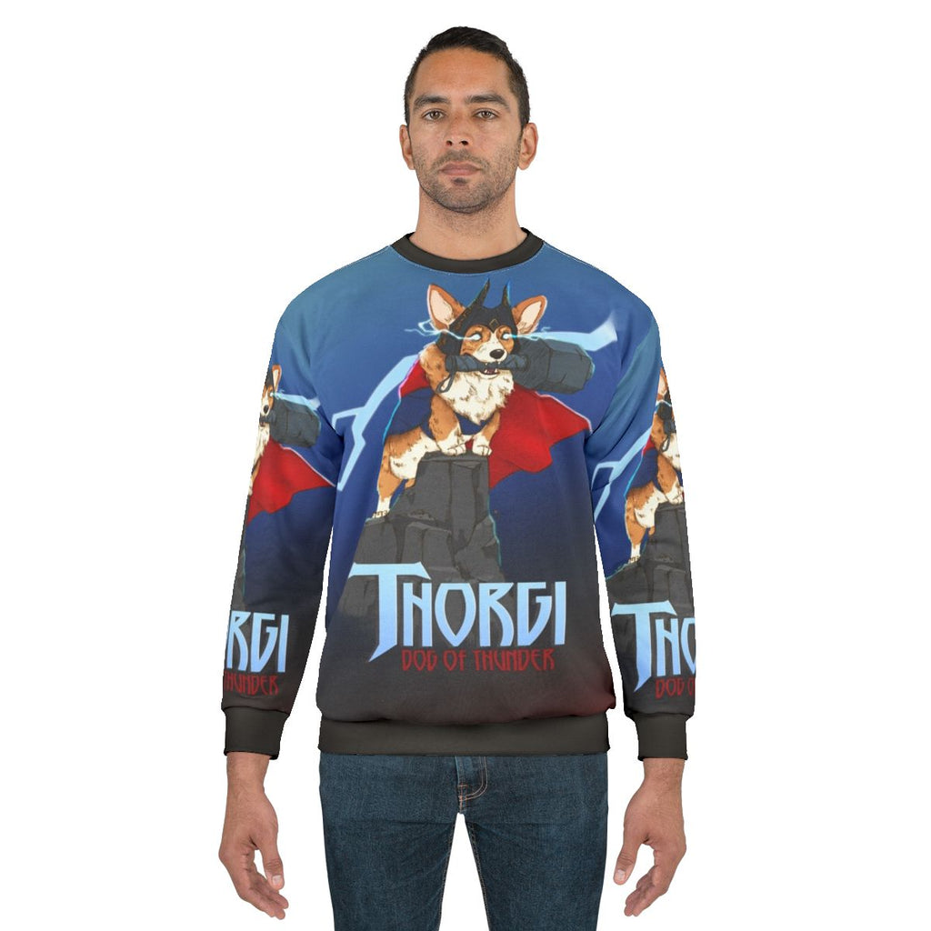 Corgi wearing a sweatshirt with Thor's hammer and lightning design