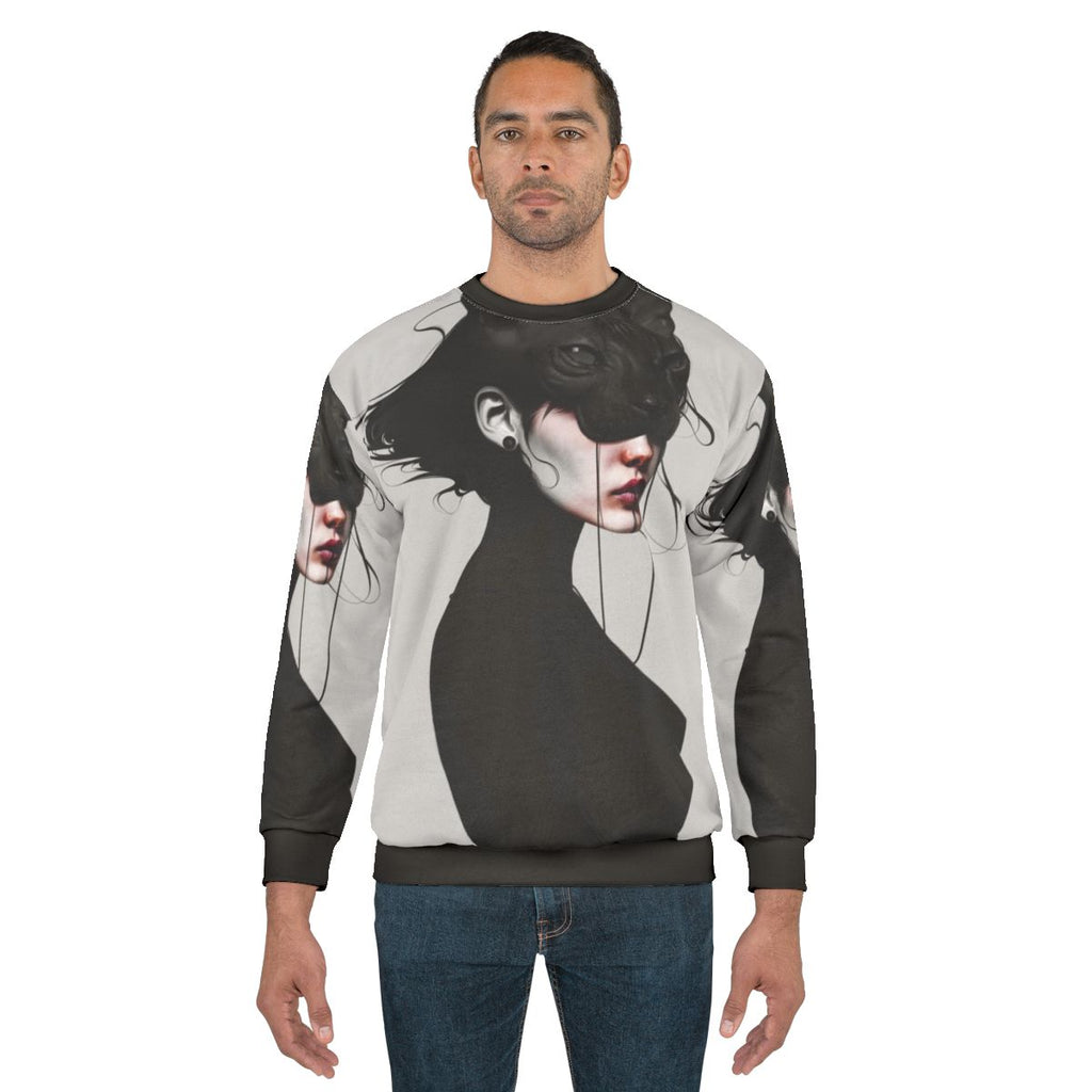 Realism black and white portrait of a cat's eyes on a sweatshirt