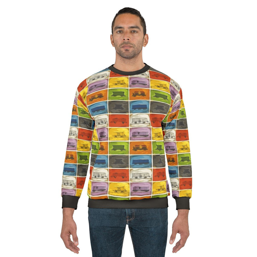 Retro board game lover wearing a Ticket to Ride-themed sweatshirt