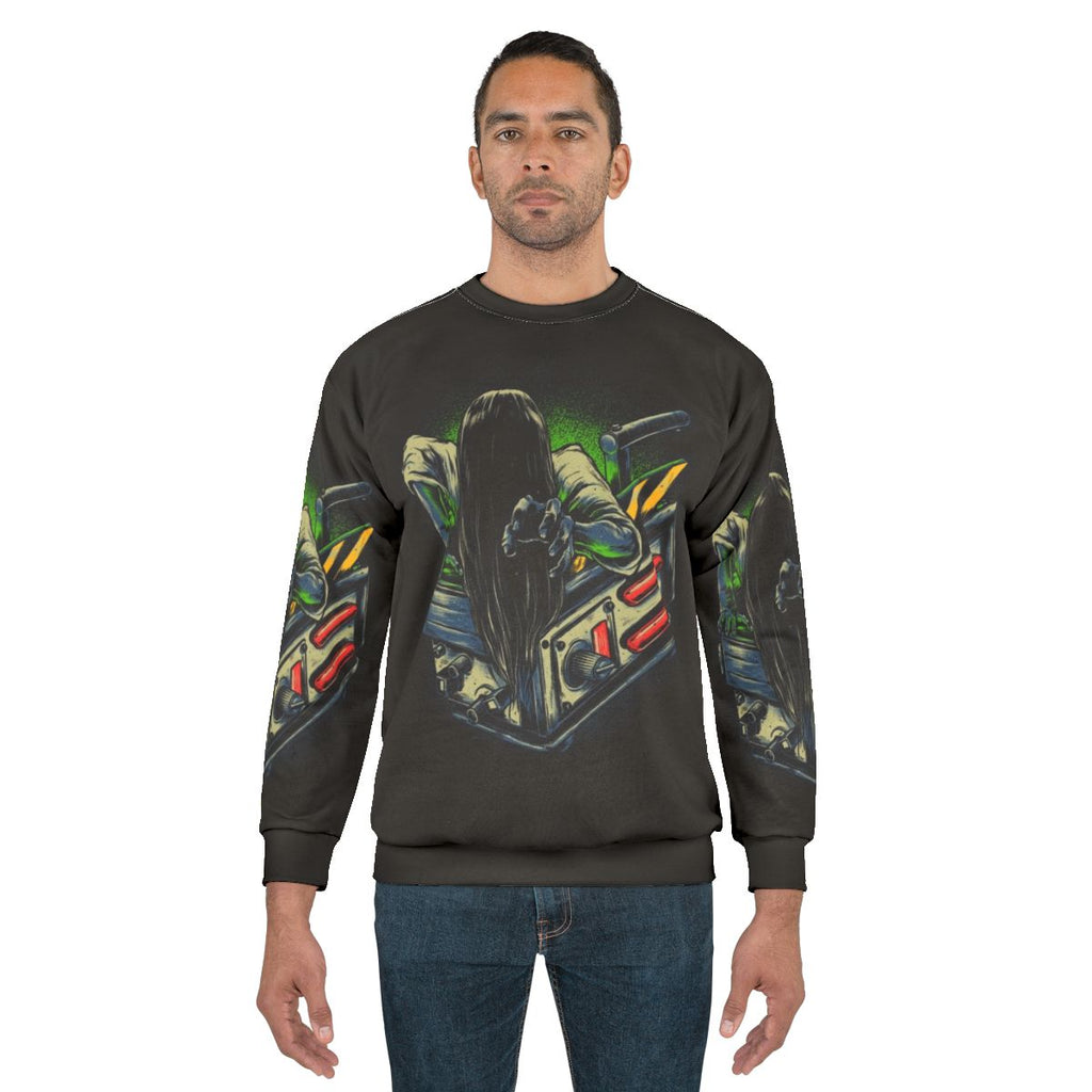 Trapped ghost design on a grey sweatshirt